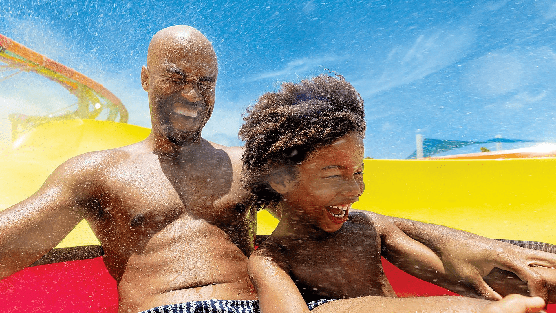perfect-day-coco-cay-thrill-water-park-slingshot-father-son-laughing